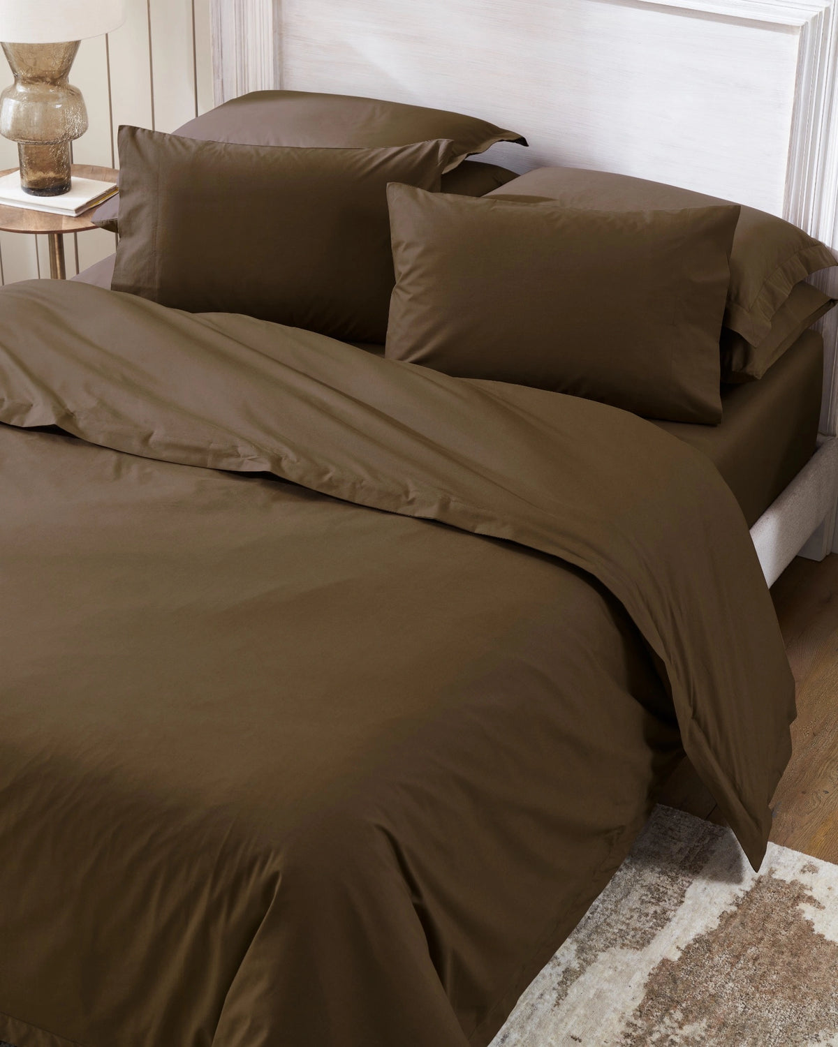 Baked Clay 400TC percale duvet cover with flange, top view on a made bed