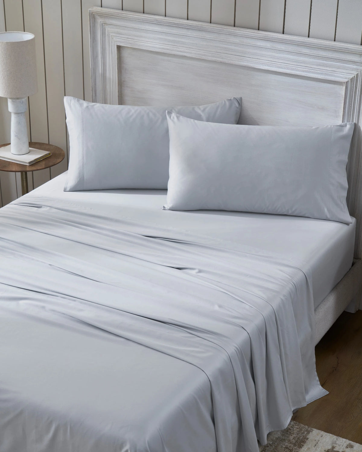 Cool Grey 600TC sateen fitted sheet set with king pillowcases, top view on a made bed