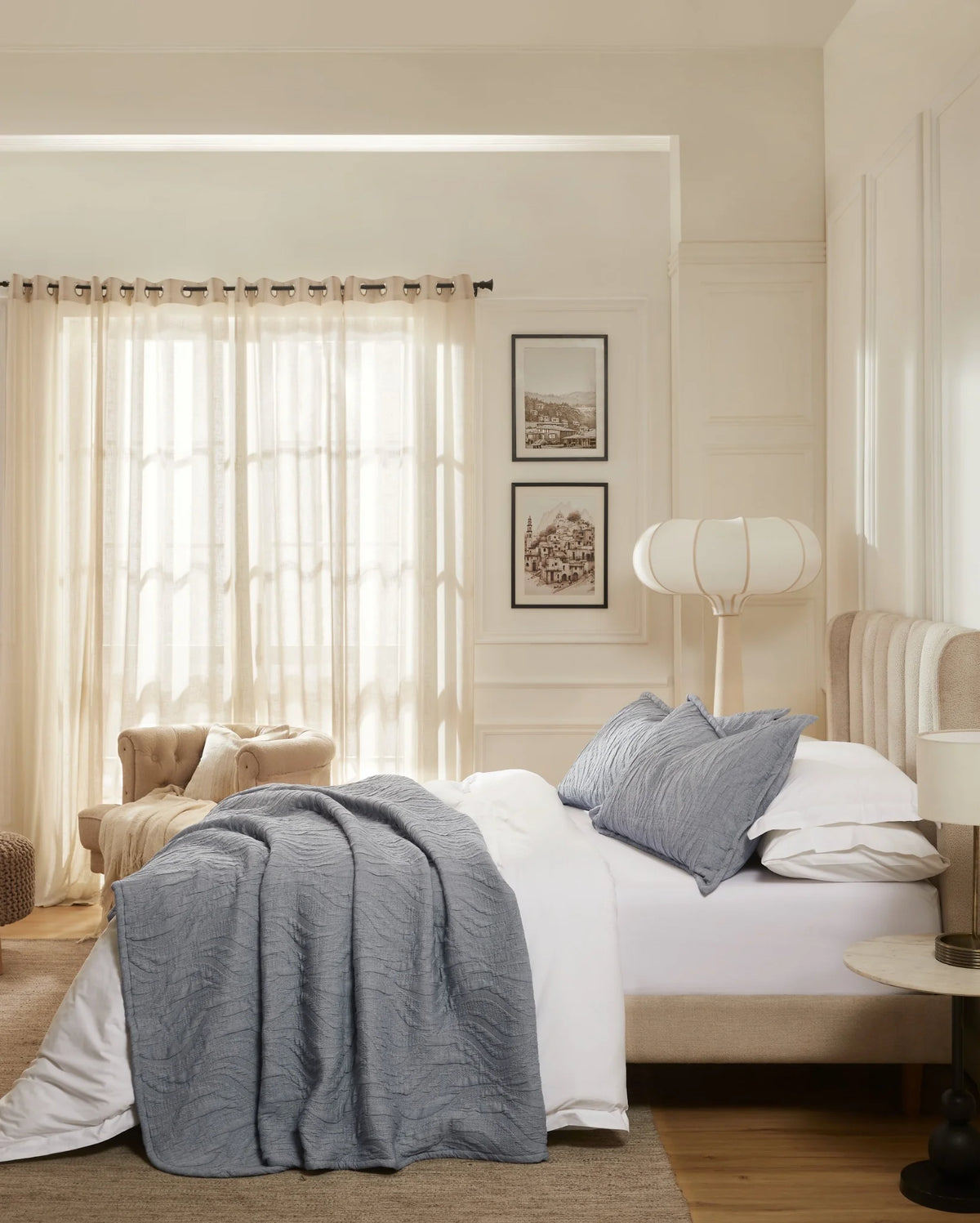 Denim Waves cotton-poly bedspread set with king pillowcases, side view on a made bed