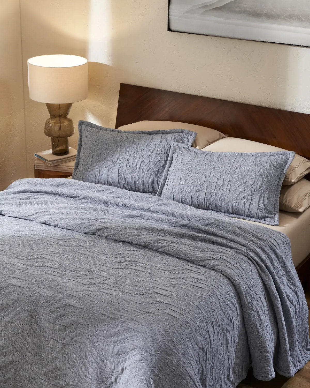 Denim Waves cotton-poly bedspread set with standard pillowcases, top view on a made bed