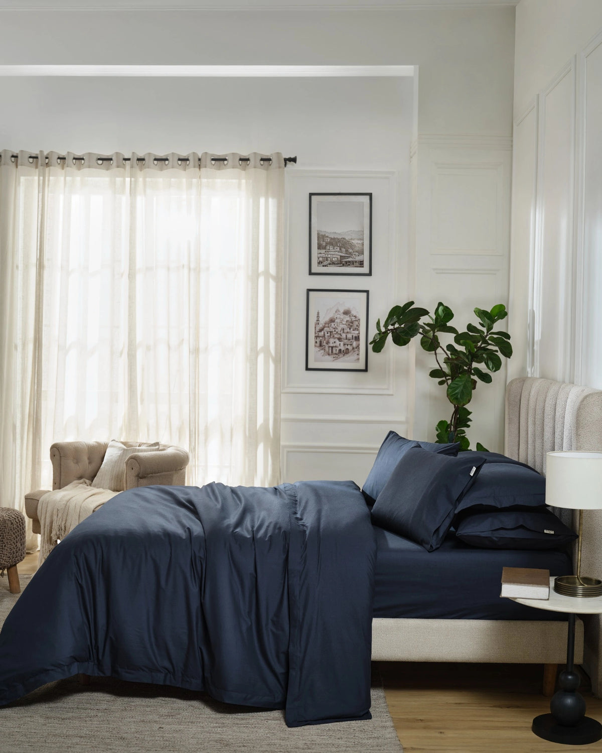 Dress Blue 400TC percale duvet cover with flange, side view on a made bed