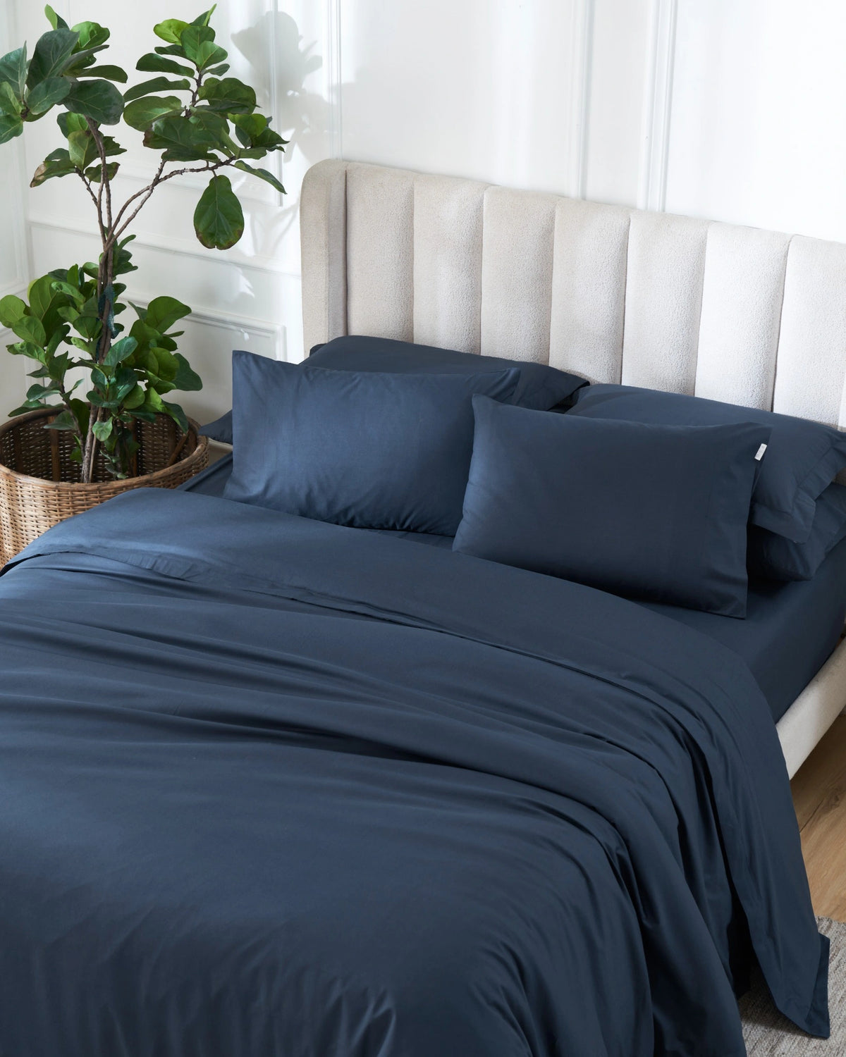 Dress Blue 400TC percale duvet cover with flange, top view on a made bed