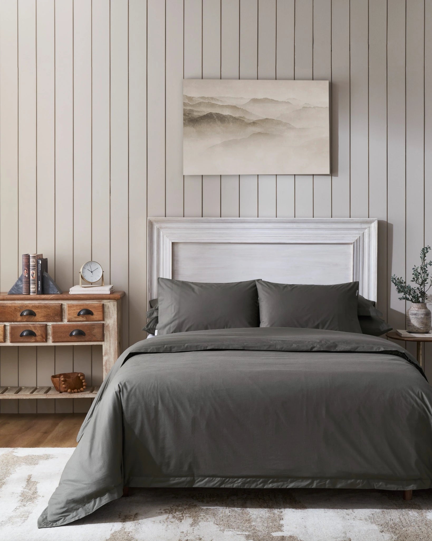 Granite 400TC percale duvet cover with flange, front view on a made bed