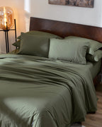 Ivy Green 400TC percale duvet cover with flange, top view on a made bed