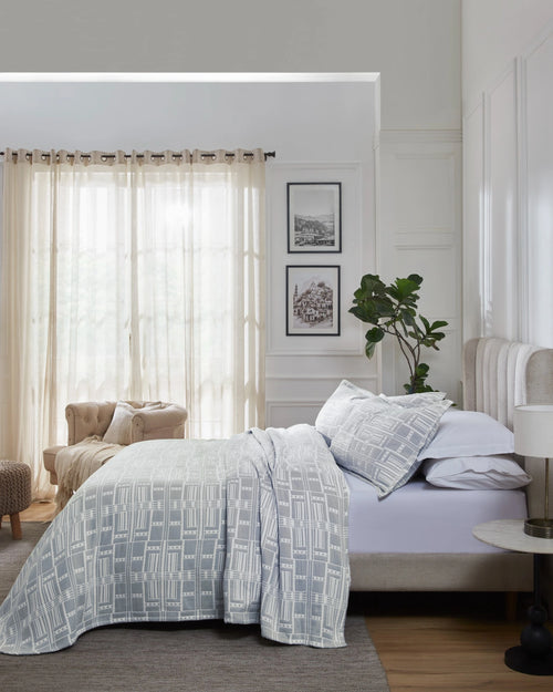 Morning Fog Modern Geo 100% cotton bedspread set with king pillowcases, side view on a made bed