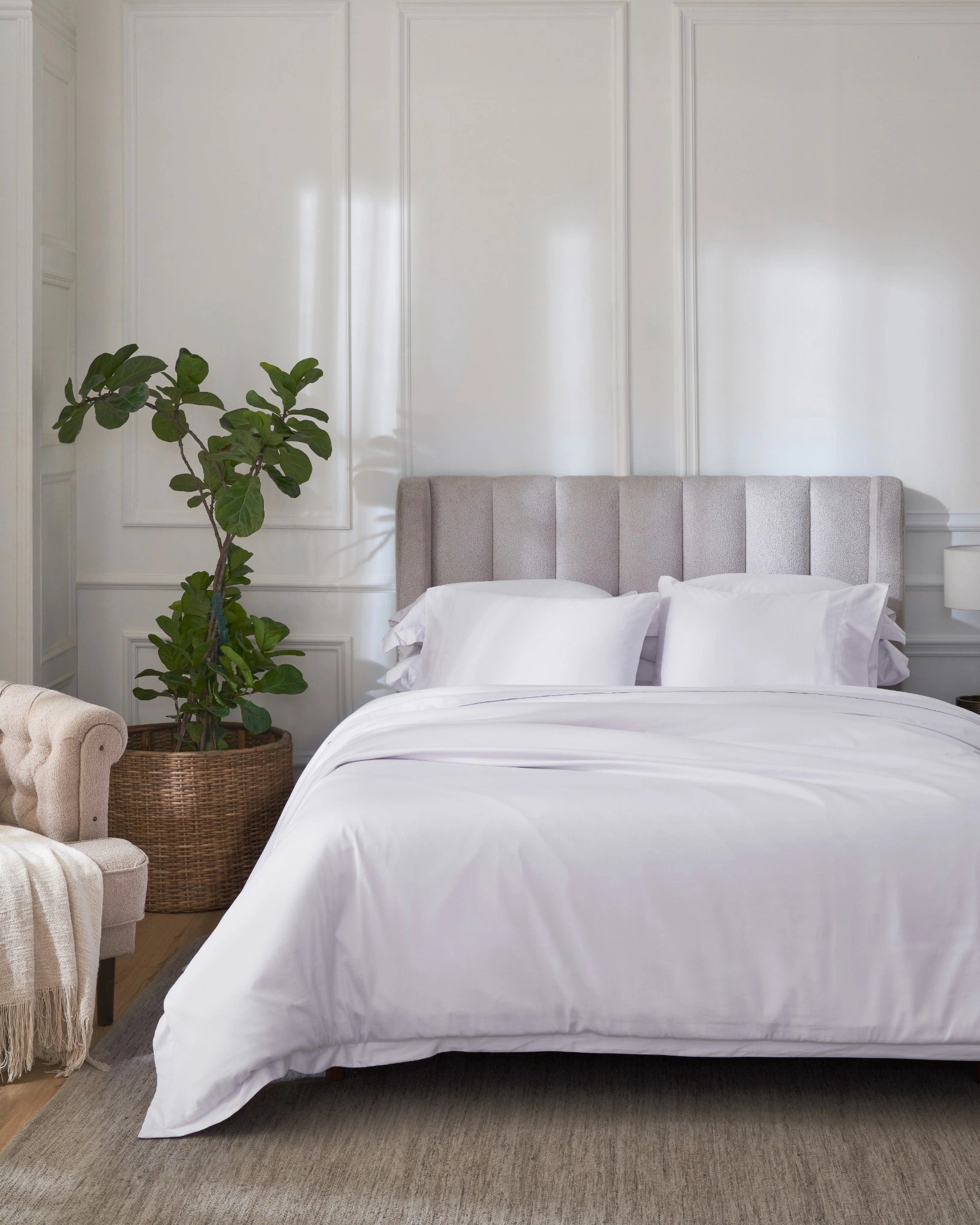 Orchid Tint 600TC sateen duvet cover with flange, front view on a made bed