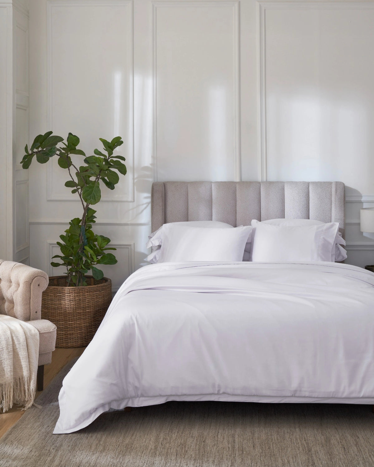 Orchid Tint 600TC sateen duvet cover with flange, front view on a made bed