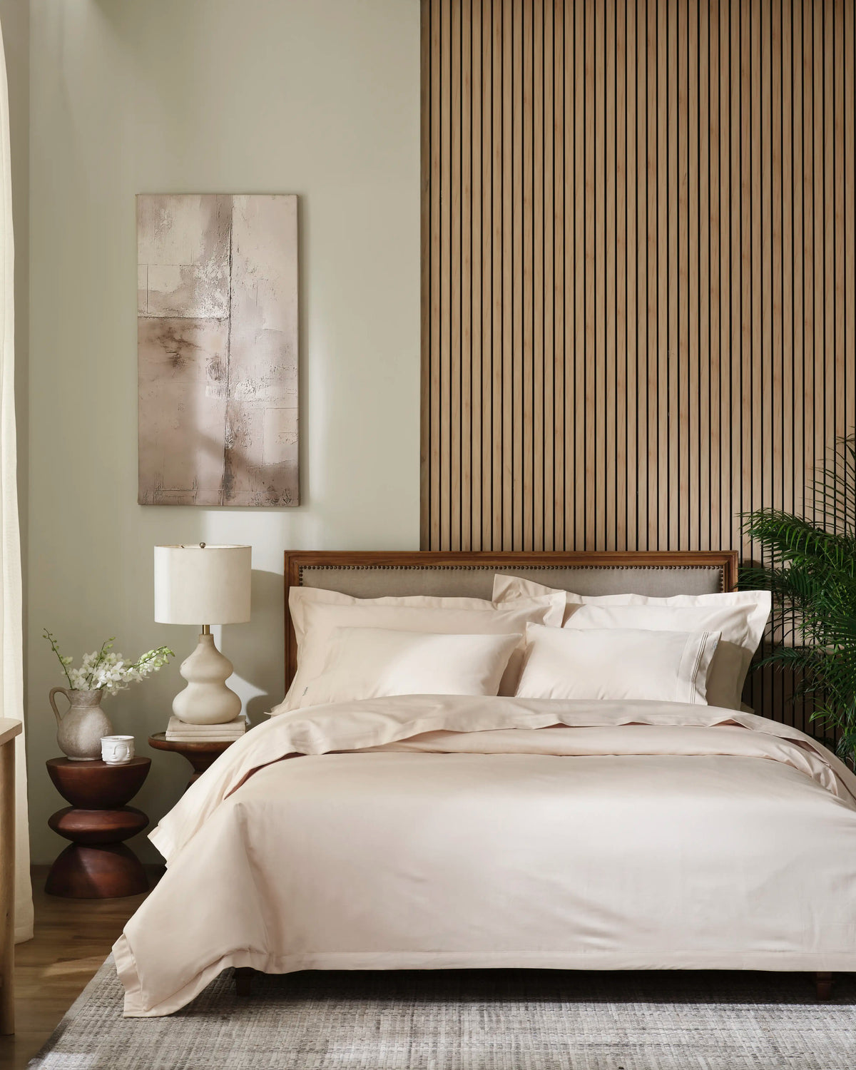 Tapioca 1000TC sateen duvet cover with flange, front view on a made bed