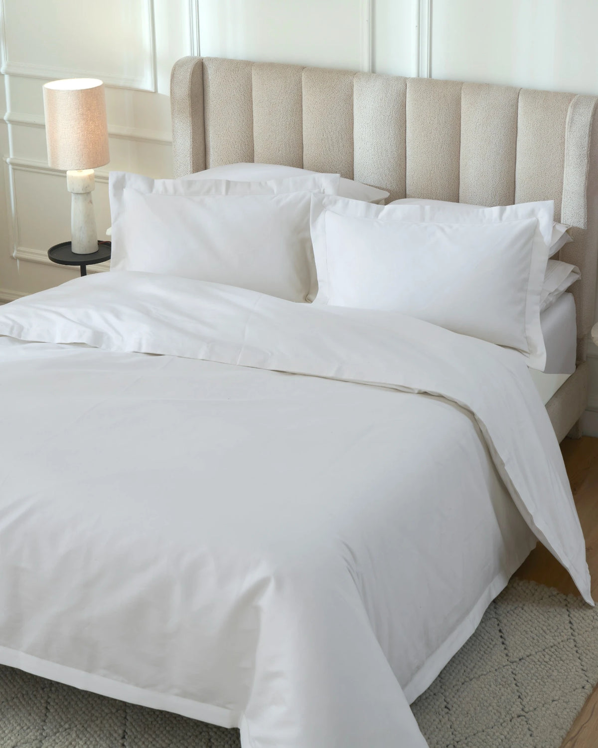 Tofu 1000TC sateen duvet cover with flange, top view on a made bed