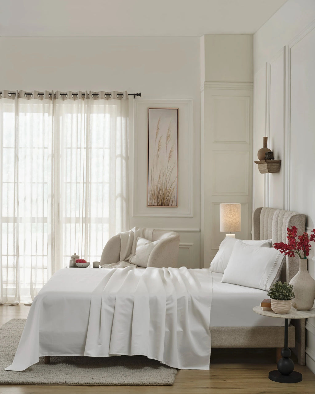 Tofu 1000TC sateen flat and fitted sheet set with standard pillow covers, side view on a made bed