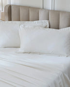 Tofu 1000TC sateen king pillow cover set with flange, top view on a made bed