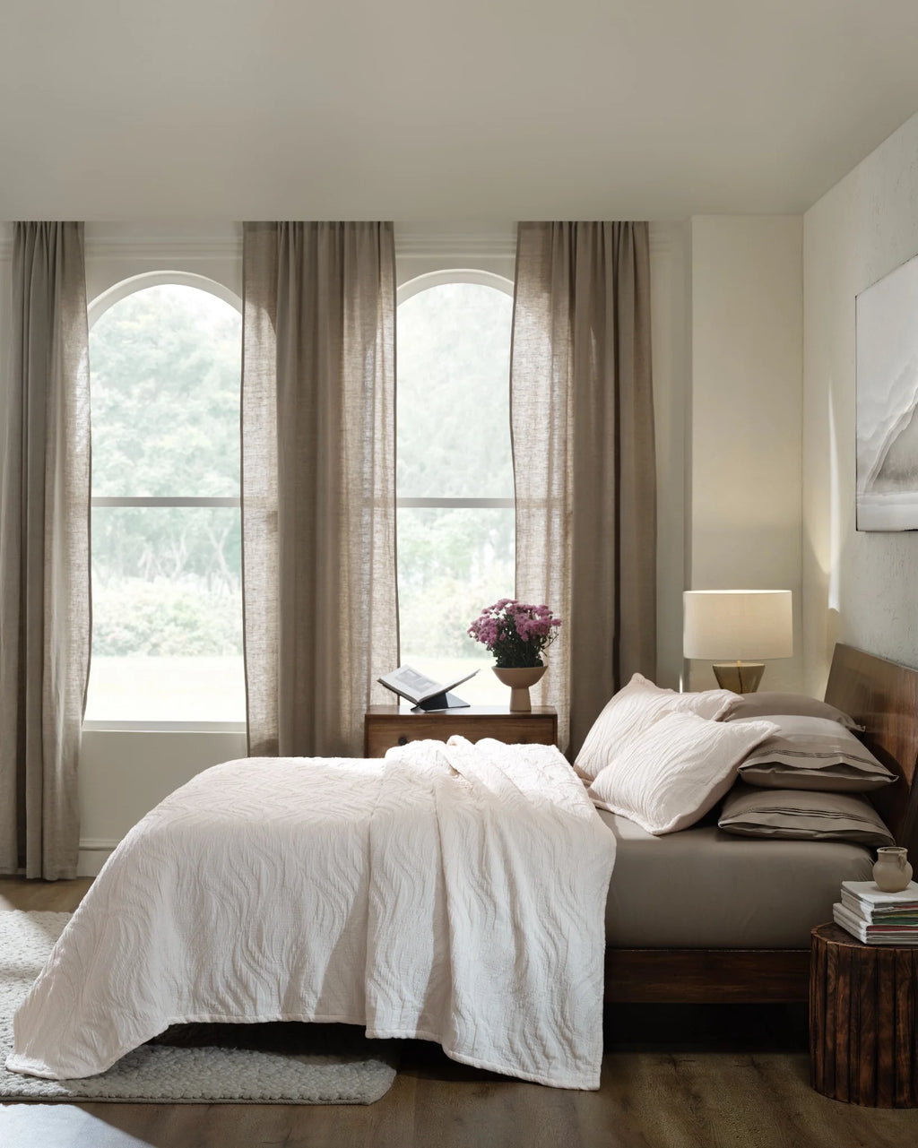 Vanilla Waves cotton-poly bedspread set with standard pillow covers, side view on a made bed