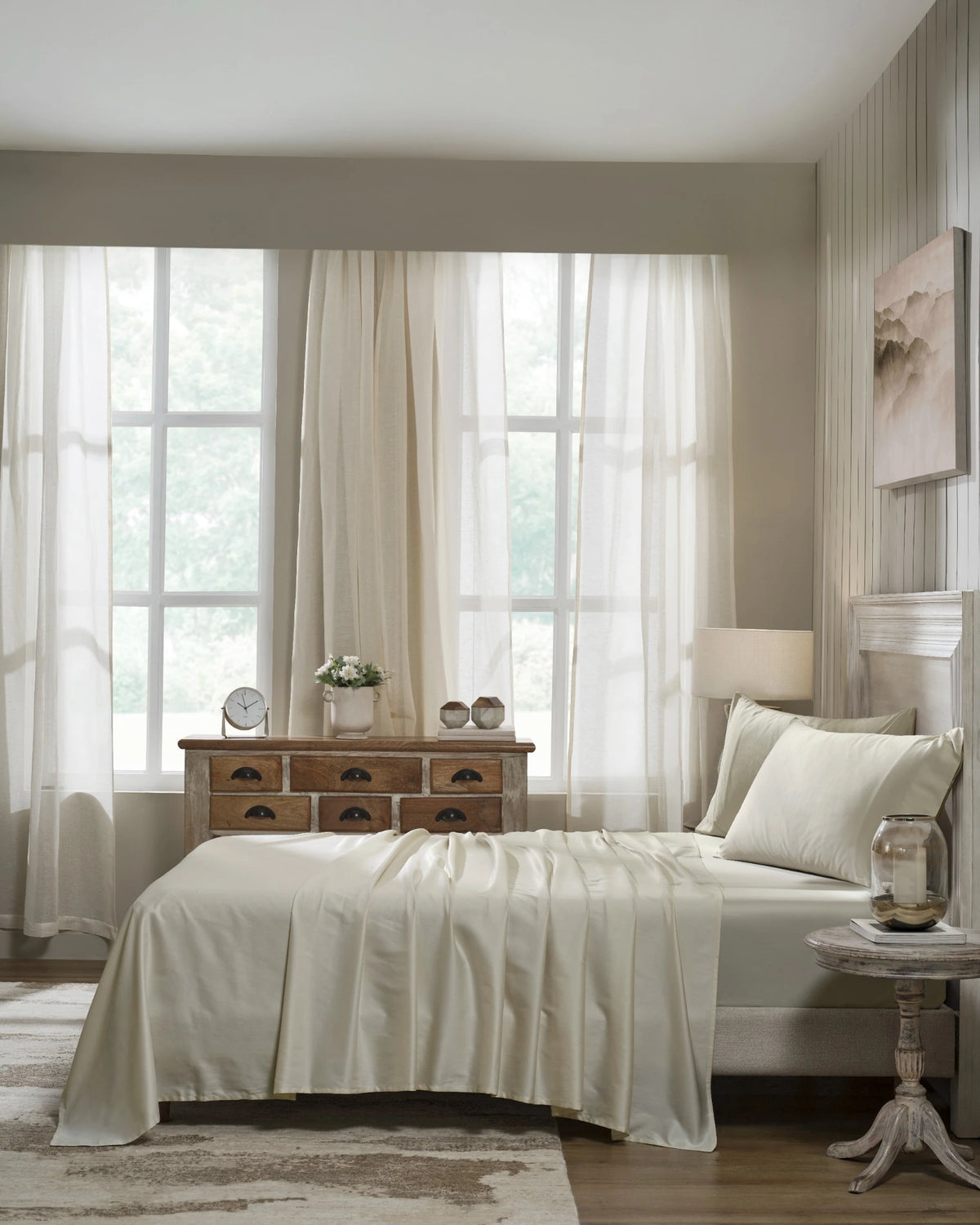 White Sand 600TC sateen flat sheet set with king pillow covers, side view on a made bed