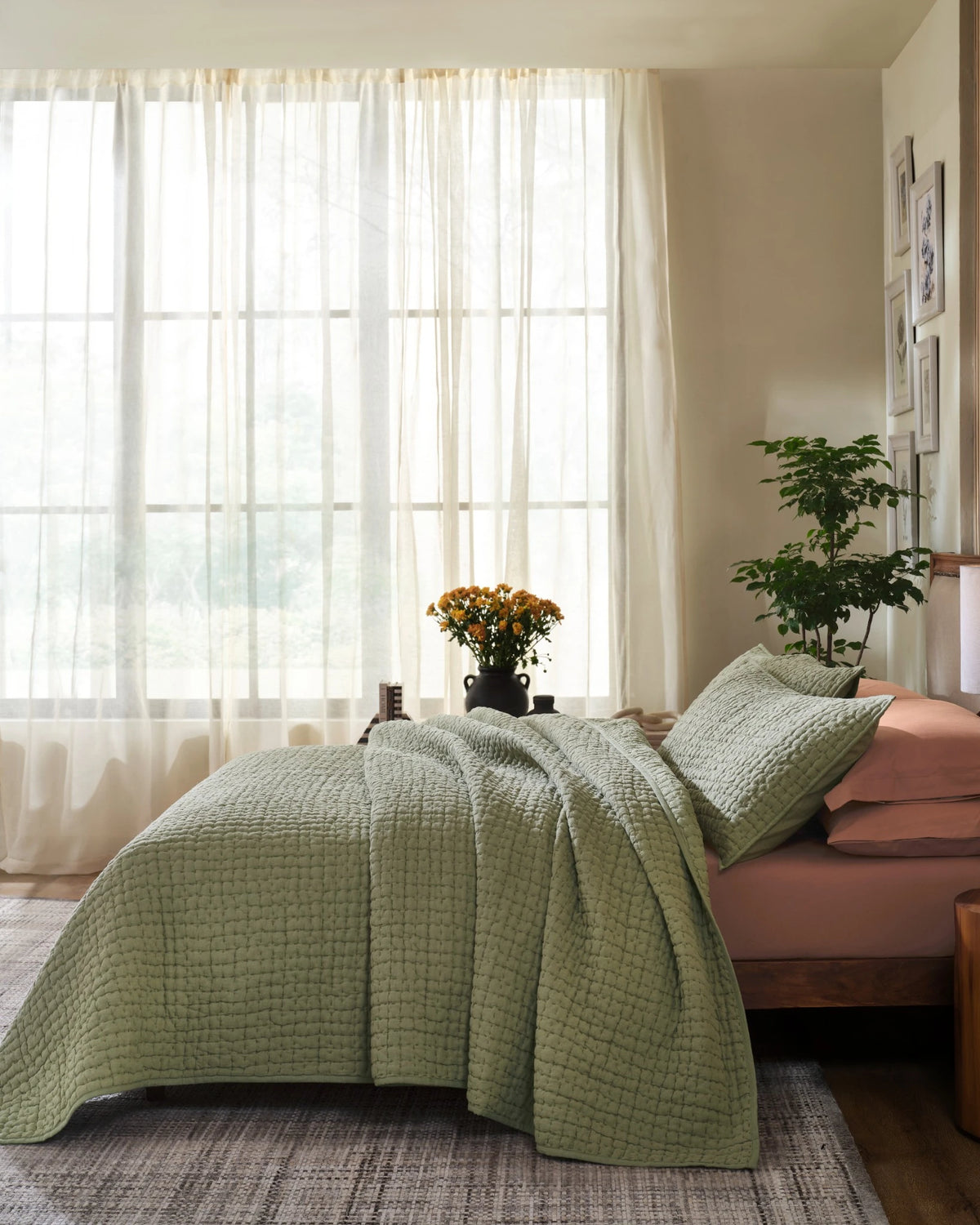 Willow Leaf European linen box-stitch hand quilt set with king pillowcases, side view on a made bed