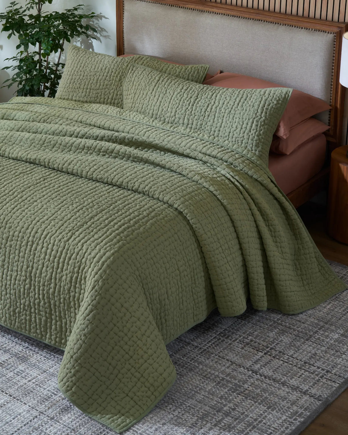 Willow Leaf European linen box-stitch hand quilt set with king pillowcases, top view on a made bed